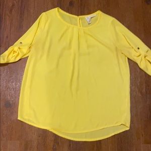 Bright yellow blouse